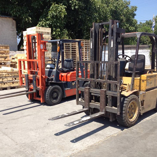 Neatly stacked new wooden pallets.
